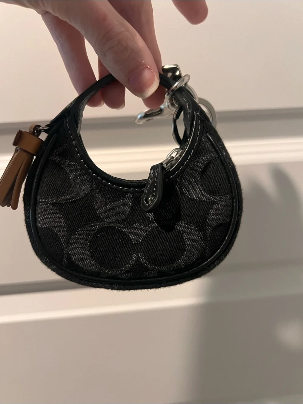 Coach Black Mini Signature Circle Bag Charm with Tan Tassel - Picture 7 of 11